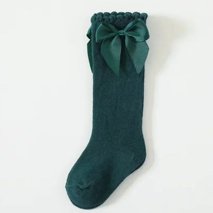 🎀 Medias Altas Infantiles con Moño Rojo – Antideslizantes, Algodón Suave.